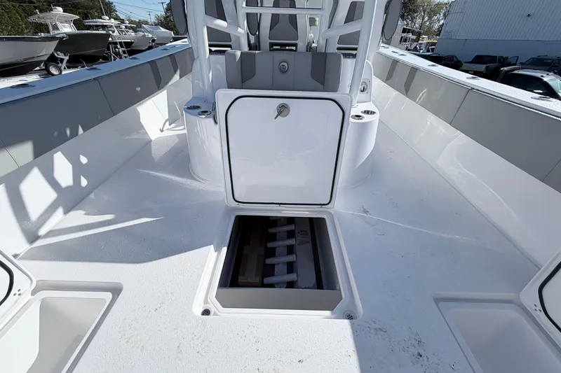 Slide: The Image of 2026 Cape Horn 39XS boat deck with storage compartments and seating area. - 21
