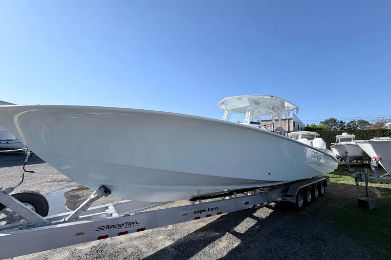The Image of 2026 Cape Horn 39XS boat on trailer under clear blue sky. - 0