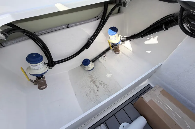 Slide: The Image of Bilge area of 2026 Cape Horn 39XS boat with visible plumbing and wiring. - 23