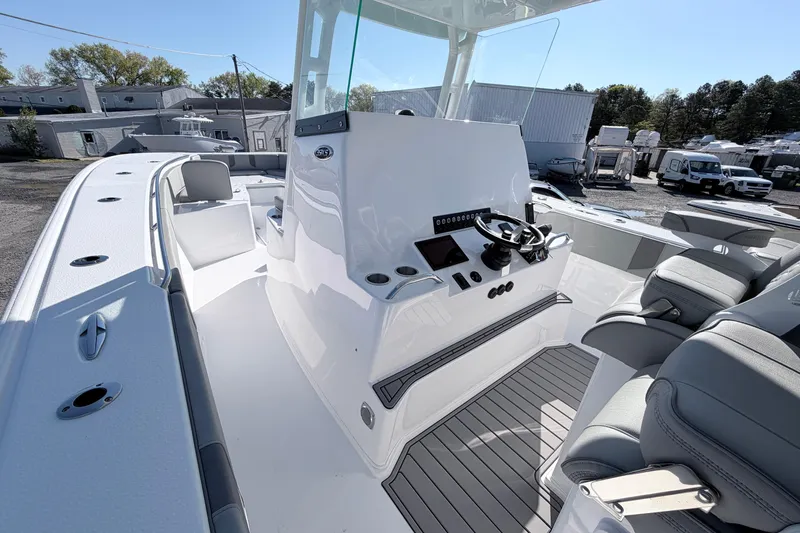 Slide: The Image of 2026 Cape Horn 39XS boat interior with modern helm and seating. - 7