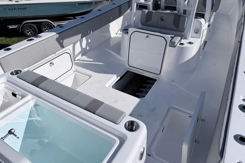 Slide: The Image of 2026 Cape Horn 39XS boat interior with seating, storage, and livewell features. - 18