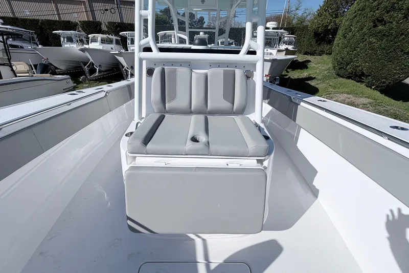 Slide: The Image of 2026 Cape Horn 39XS boat interior with gray seating and cup holder. - 13