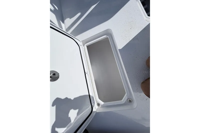 Slide: The Image of Open storage compartment on 2026 Cape Horn 39XS boat deck. - 24