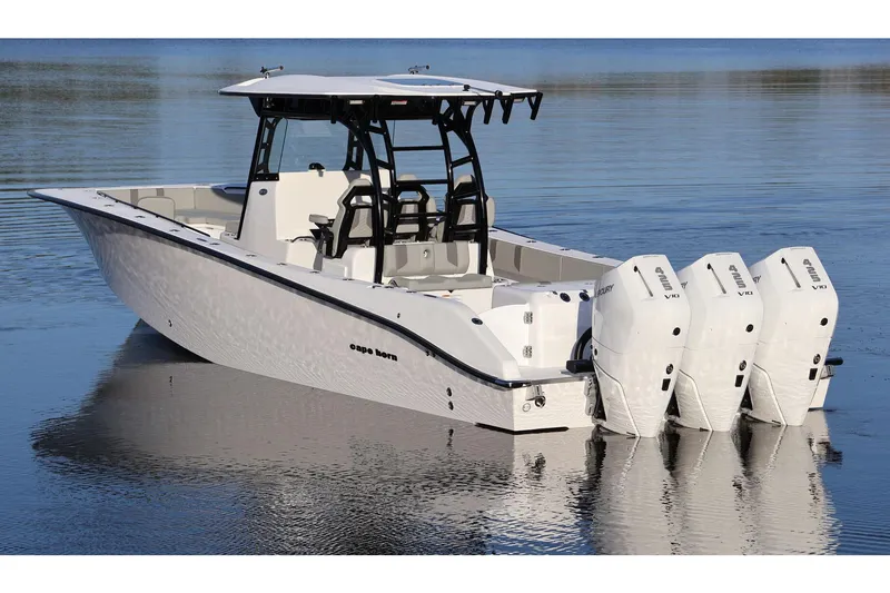 Slide: The Image of Manufacturer Provided Image: 2026 Cape Horn 39XS boat with triple Mercury V10 engines on calm water. - 34