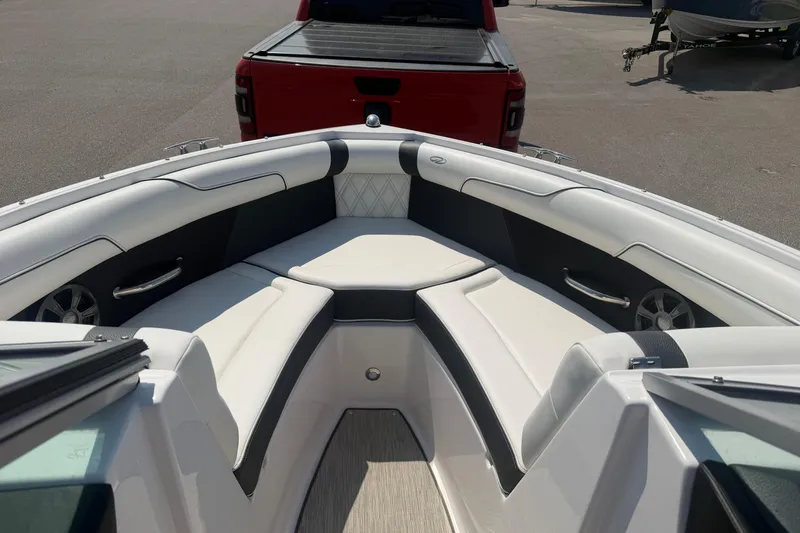 Slide: The Image of 2019 Regal 2100 boat interior with white seating and modern design. - 15