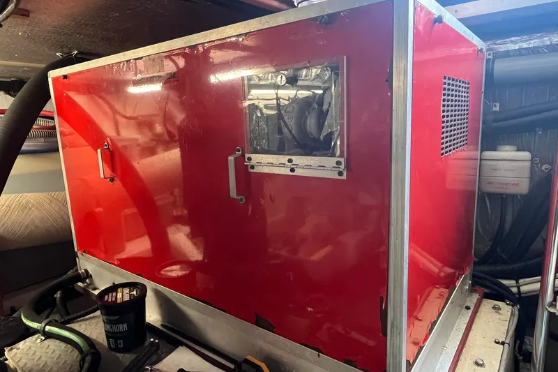 Slide: The Image of Red generator in the engine room of a 1996 Sea Ray 500 Sedan Bridge yacht. - 19
