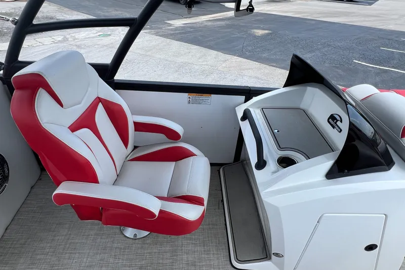 Slide: The Image of Red and white captain's chair in 2020 Monterra Surf boat cockpit. - 12