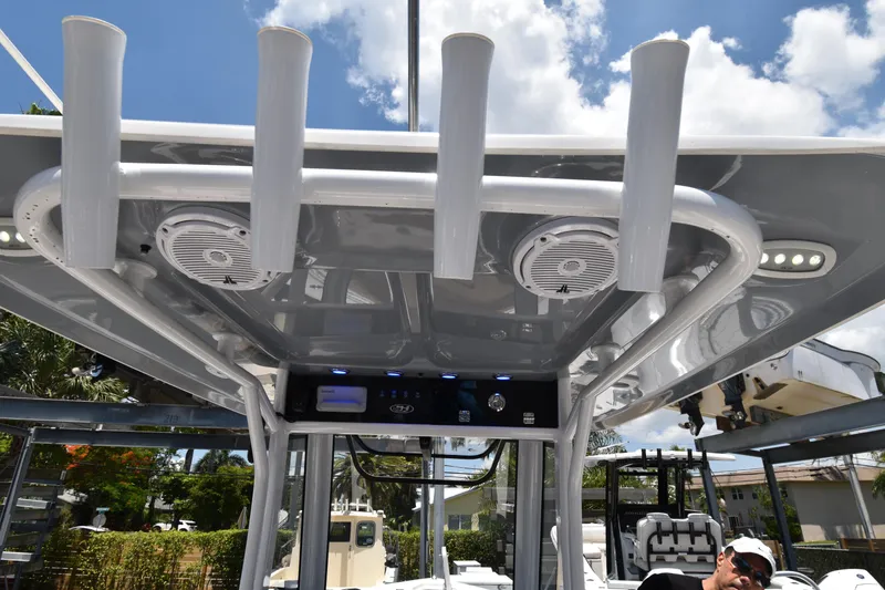 Slide: The Image of 2020 Sea Hunt Ultra 275 SE boat with rod holders and speakers under T-top. - 5