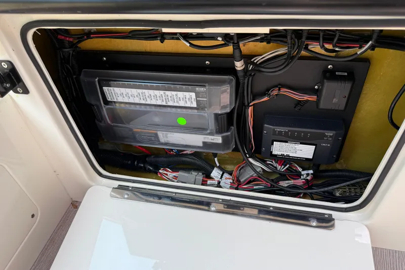 Slide: The Image of 2024 Navan C30 electrical panel with organized wiring and components. - 33