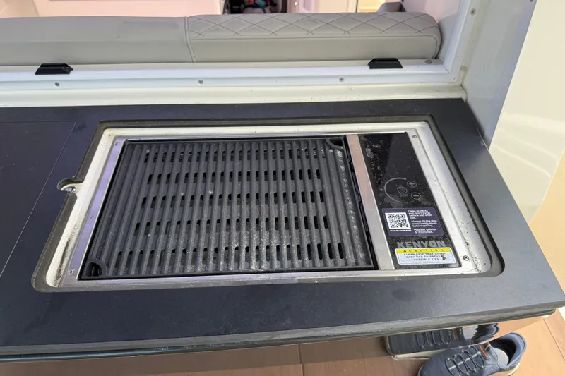 Slide: The Image of Built-in Kenyon grill in 2024 Navan C30, featuring sleek design and modern controls. - 40