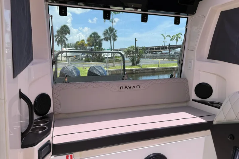 Slide: The Image of Interior view of 2024 Navan C30 boat with seating and cup holders. - 8