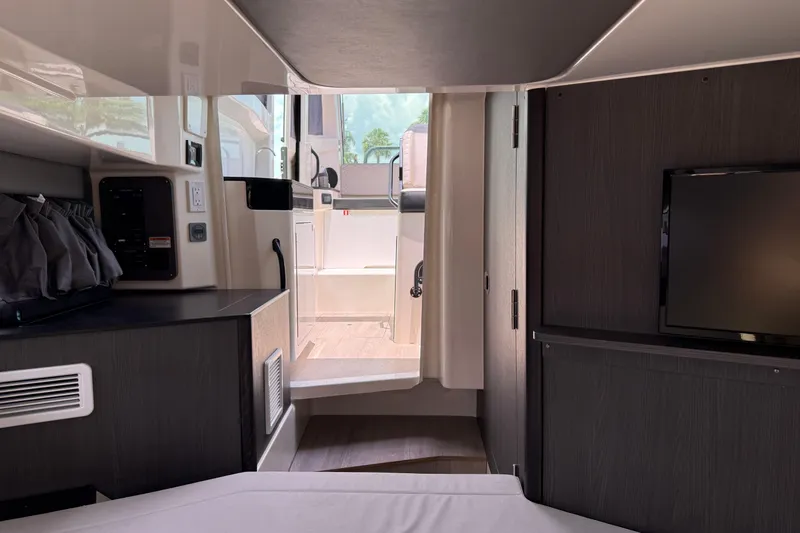 Slide: The Image of Interior of 2024 Navan C30 boat, featuring modern design and compact living space. - 29