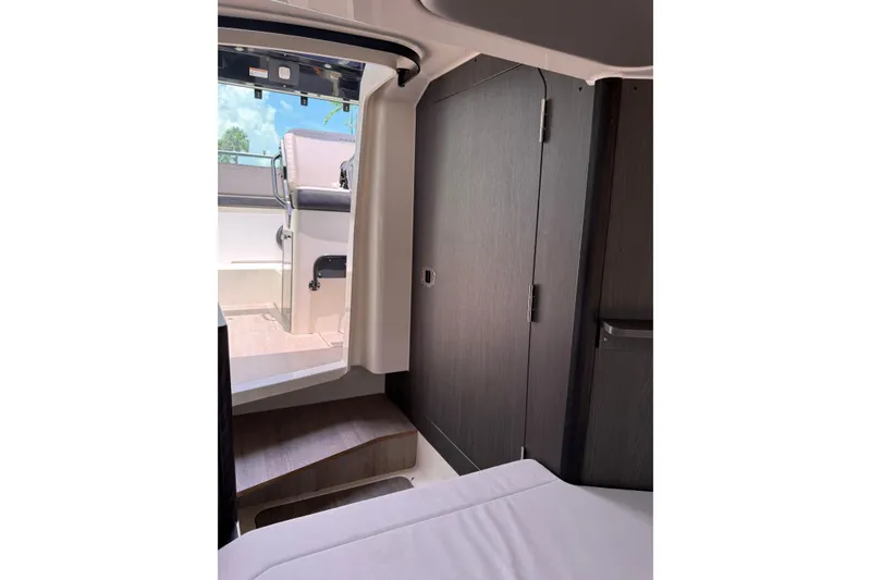 Slide: The Image of Interior view of 2024 Navan C30 boat, featuring sleek design and modern furnishings. - 30