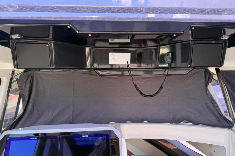 Slide: The Image of 2024 Navan C30 boat interior with control panel and navigation equipment. - 36