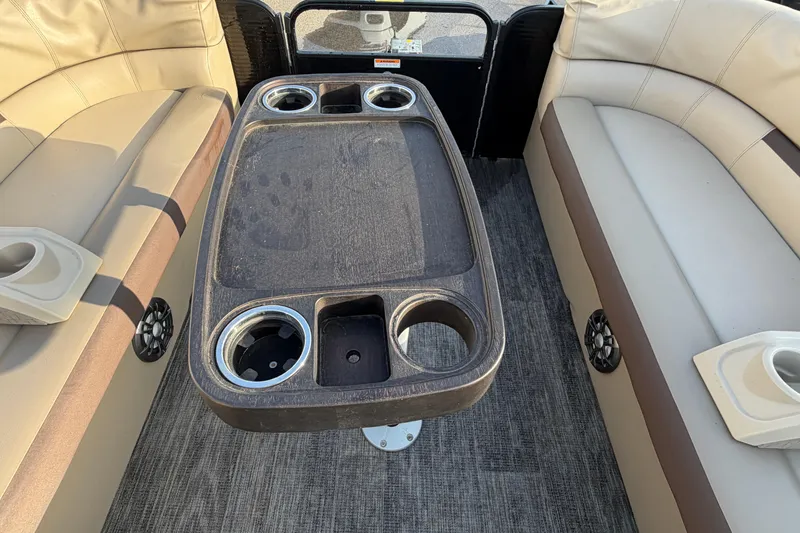Slide: The Image of Interior of 2023 Godfrey Sweetwater 2286 C pontoon boat with seating and cup holders. - 21