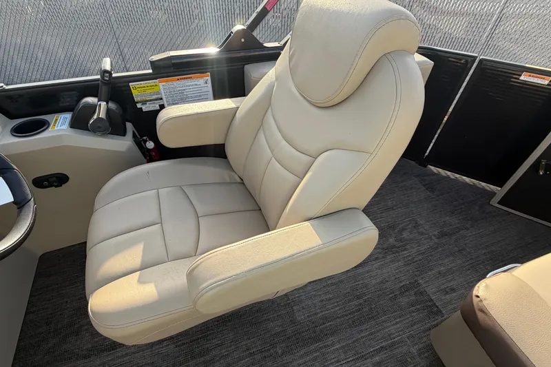 Slide: The Image of Luxurious captain's chair on 2023 Godfrey Sweetwater 2286 C pontoon boat. - 12