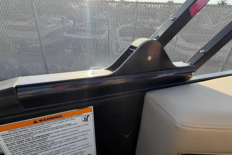 Slide: The Image of 2023 Godfrey Sweetwater 2286 C boat interior detail with safety warning label. - 18
