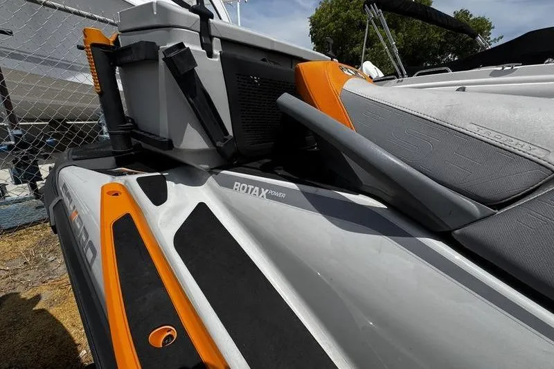 Slide: The Image of 2023 Sea-Doo FishPro Trophy with Rotax engine, featuring orange and gray design. - 13