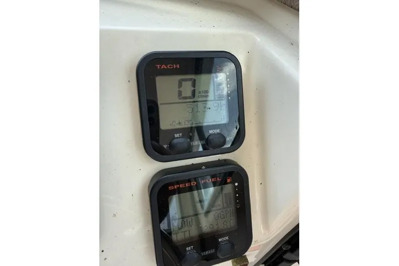 Slide: The Image of Close-up of tachometer and speed fuel gauges on a 2006 Parker 2520 SL Sport Cabin boat. - 20