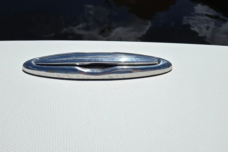 Slide: The Image of Chrome cleat on 2018 Regulator 28 Forward Seating boat deck. - 15