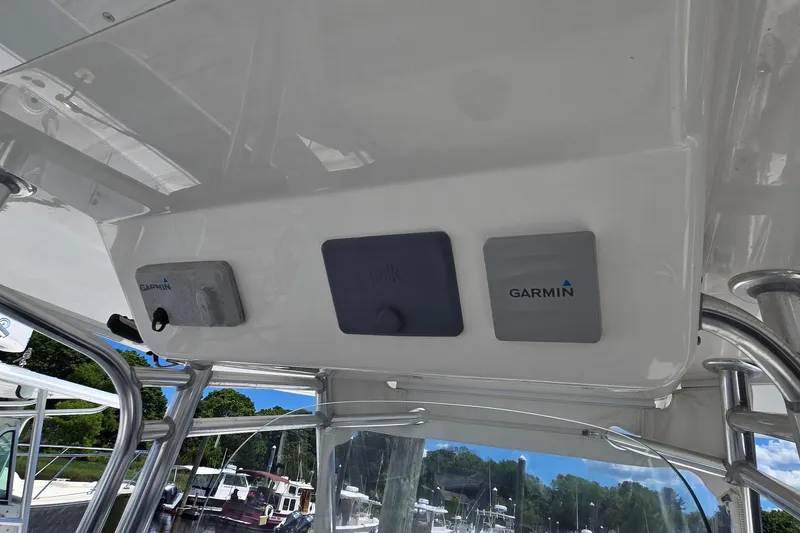 Slide: The Image of 2018 Regulator 28 Forward Seating boat with Garmin electronics and sleek design. - 26