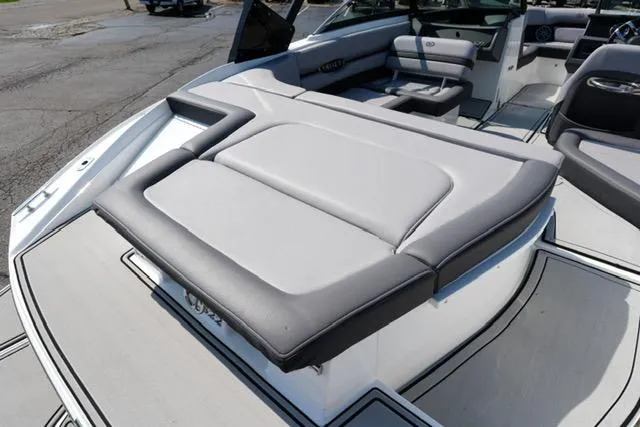 Slide: The Image of 2024 Cobalt CS22 boat interior with sleek gray seating and modern design. - 17