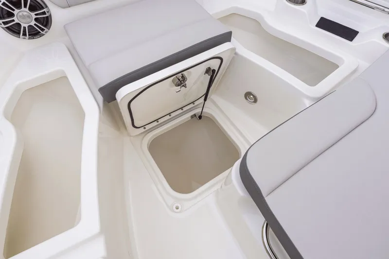 Slide: The Image of The image shows the storage area of a 2026 Sea Ray SDX 250 Outboard boat. - 9