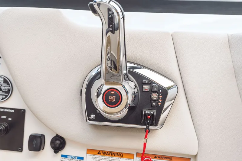 Slide: The Image of Close-up of the throttle control on a 2026 Sea Ray SDX 250 Outboard. - 21