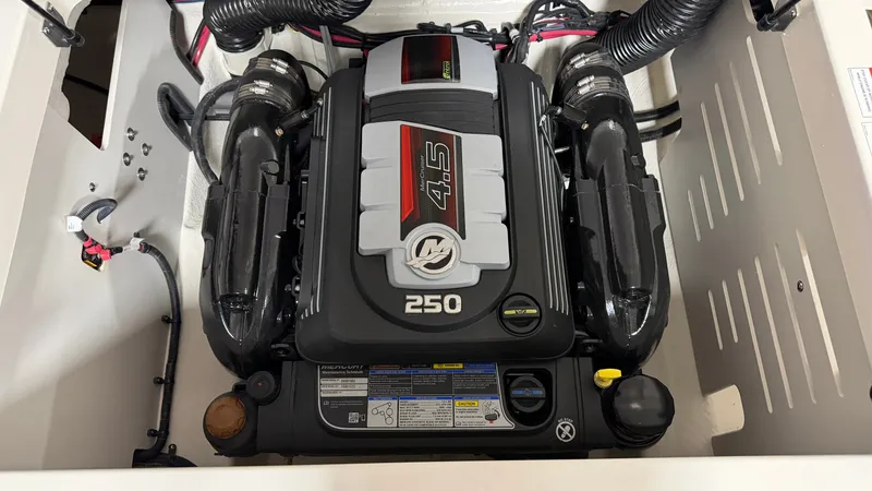 Slide: The Image of A powerful engine labeled "4.5 250" is installed in a boat. - 33