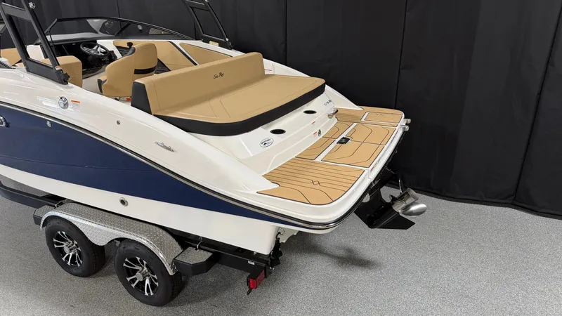 Slide: The Image of The image shows a 2027 Sea Ray SPX 210 boat with sleek design and two-tone hull. - 6