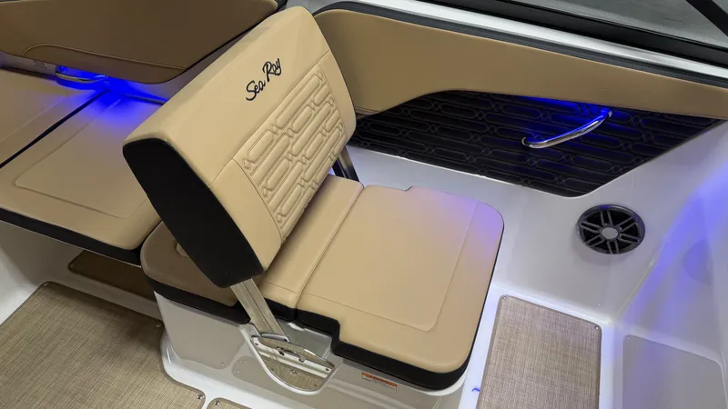 Slide: The Image of Interior of a Sea Ray SPX 210 with beige seating and blue lighting. - 41