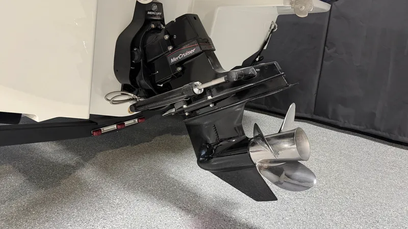 Slide: The Image of Close-up of a boat propeller and drive system in a workshop. - 7