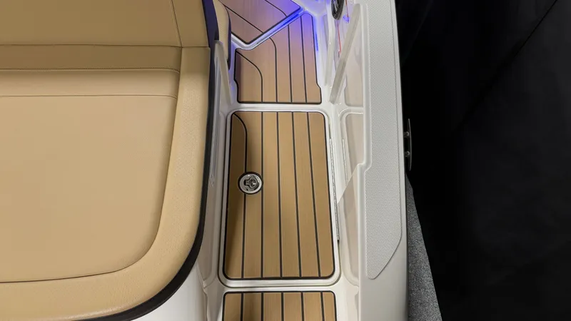 Slide: The Image of Close-up of a boat deck with wood-like finish and blue lighting. - 15
