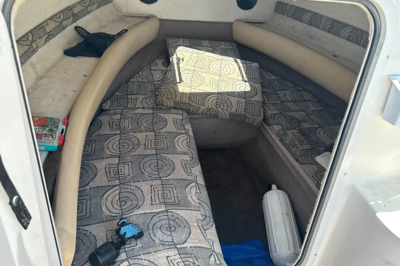 Slide: The Image of Interior of a 2002 Chaparral 205 SSe boat with patterned seating and accessories. - 21