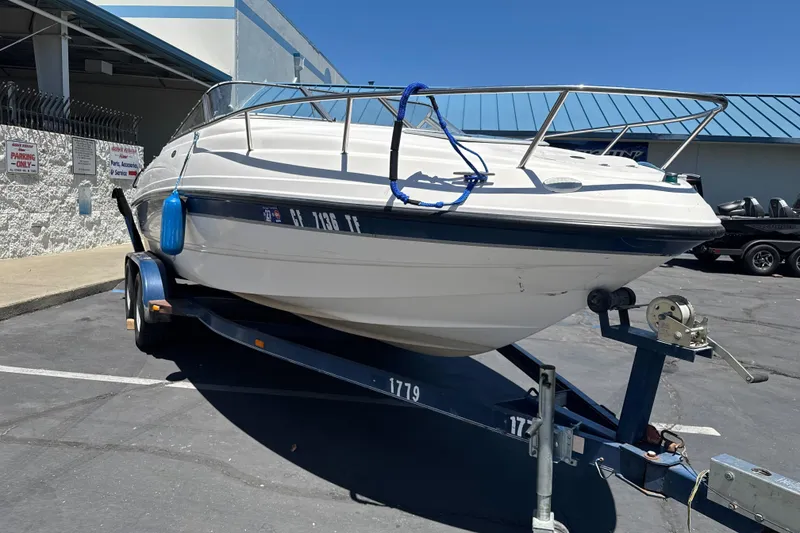 Slide: The Image of 2002 Chaparral 205 SSe boat on trailer in parking lot, sunny day. - 4
