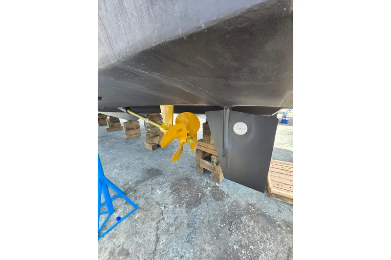 Slide: The Image of Underwater view of 2000 Ocean Alexander 60 Trawler's propeller and rudder. - 38