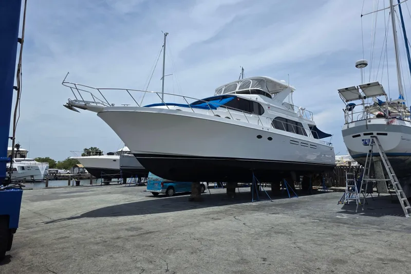 Slide: The Image of Ocean Alexander 60 Trawler 2000 on dry dock, ready for maintenance. - 1