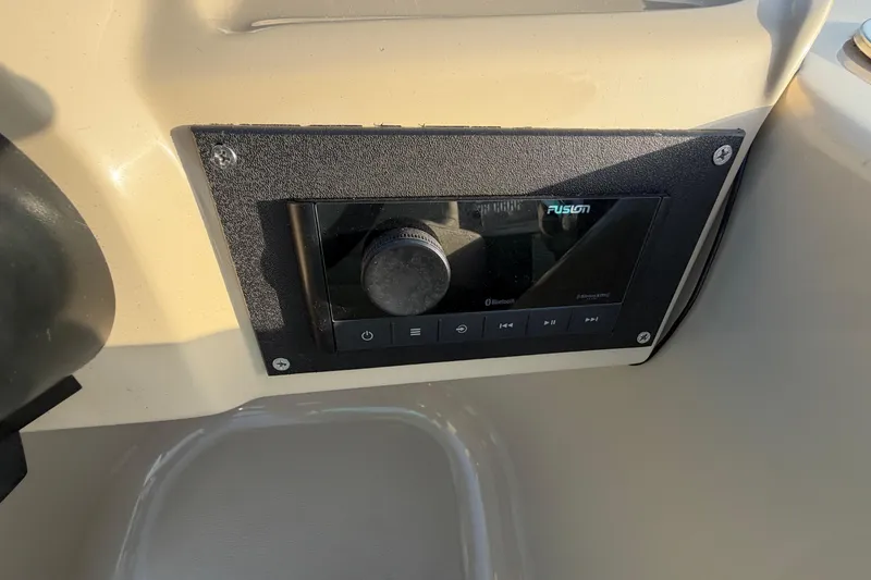 Slide: The Image of Fusion audio system on 2018 Sylvan Mirage 820 Cruise boat dashboard. - 18