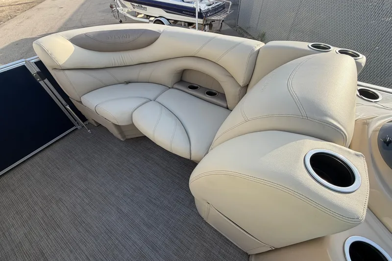 Slide: The Image of Luxurious seating on 2018 Sylvan Mirage 820 Cruise pontoon boat with cup holders. - 22
