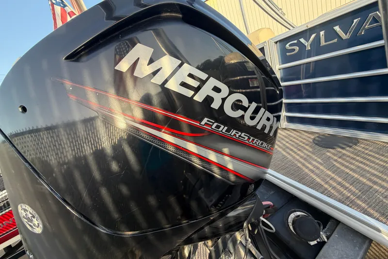 Slide: The Image of Mercury FourStroke engine on 2018 Sylvan Mirage 820 Cruise boat. - 24