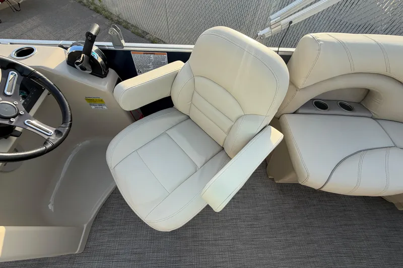 Slide: The Image of Captain's chair and helm of 2018 Sylvan Mirage 820 Cruise pontoon boat. - 15