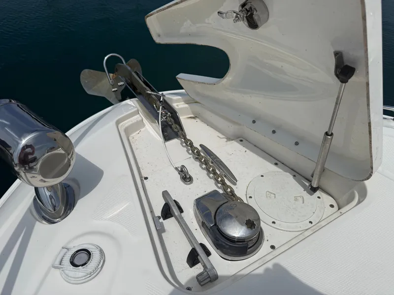 Slide: The Image of The anchor area of a 2010 Sea Ray Sundancer 310 with chain and windlass. - 44