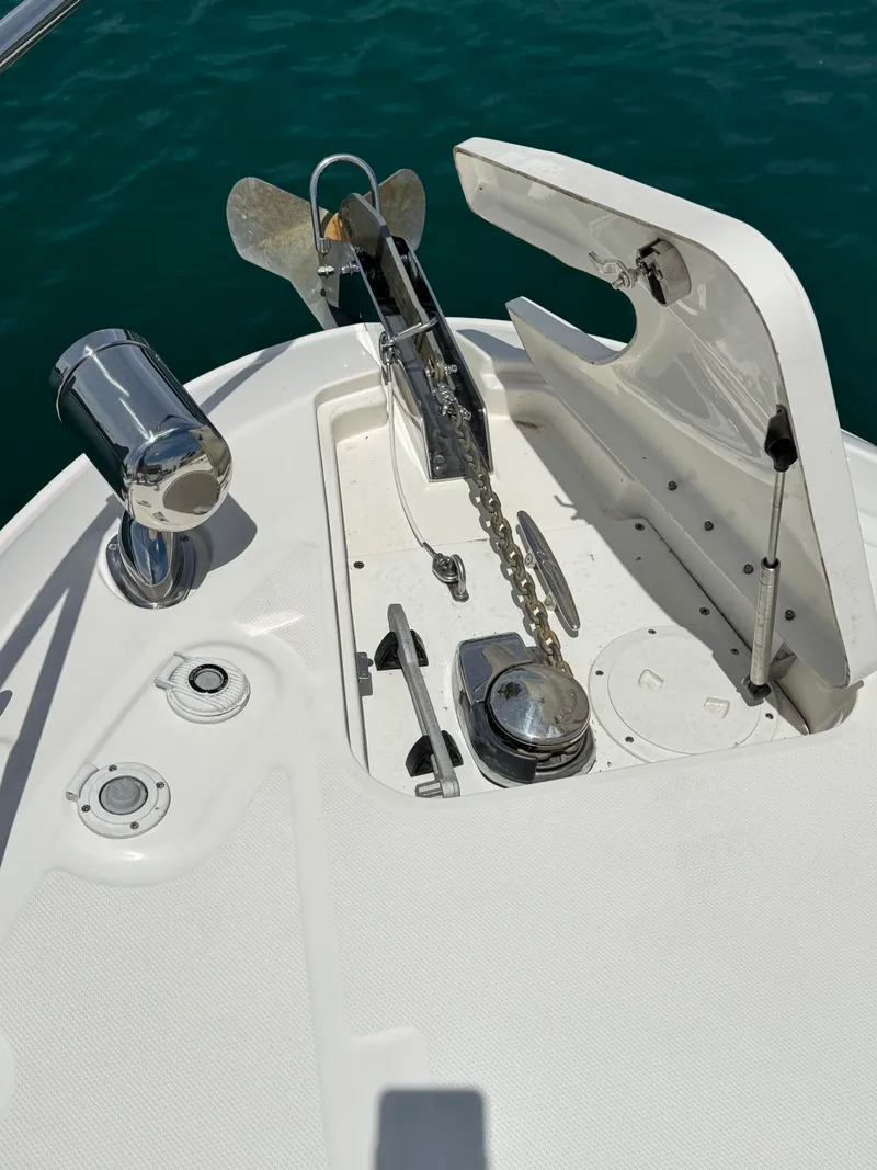Slide: The Image of The bow of a Sea Ray Sundancer 310 with anchor windlass and chain. - 17