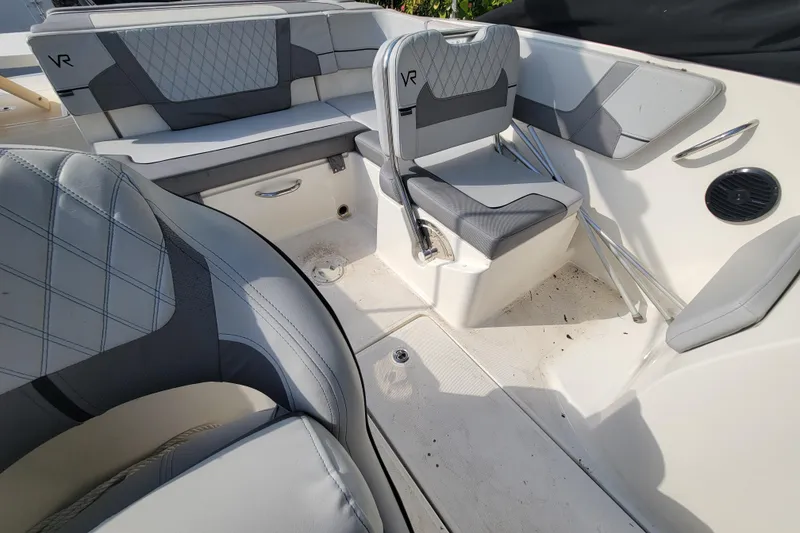 Slide: The Image of 2023 Bayliner VR6 Bowrider OB interior with gray seating and modern design. - 23