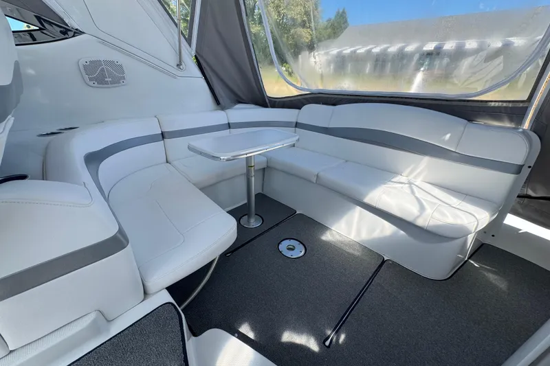 Slide: The Image of 2004 Formula 37 Performance Cruiser interior with white seating and table. - 7
