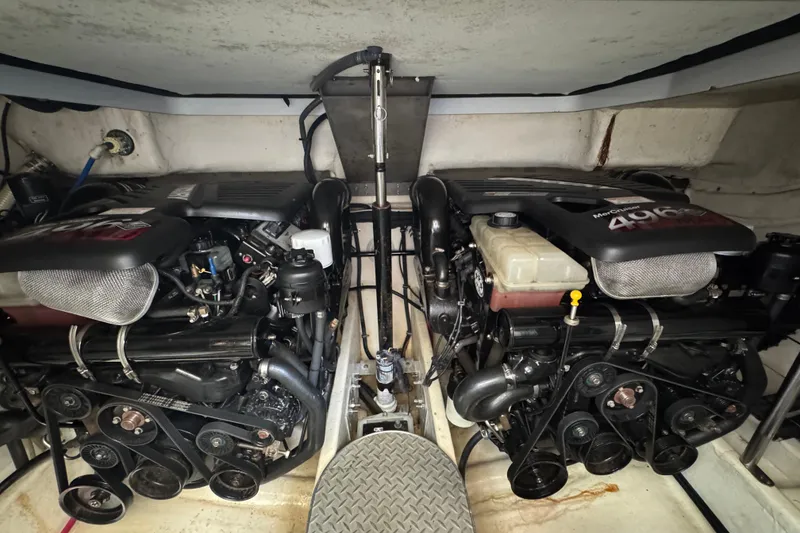 Slide: The Image of Twin MerCruiser engines in a 2004 Formula 37 Performance Cruiser engine room. - 31