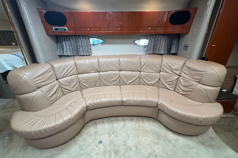 Slide: The Image of Luxurious beige leather seating in a 2004 Formula 37 Performance Cruiser cabin. - 18