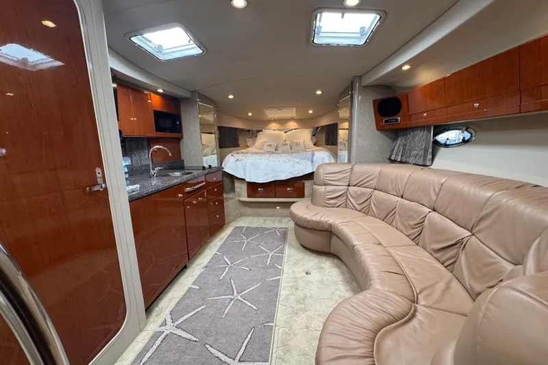 Slide: The Image of Luxurious interior of a 2004 Formula 37 Performance Cruiser with plush seating and modern amenities. - 17