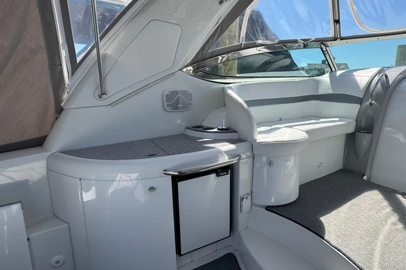 Slide: The Image of 2004 Formula 37 Performance Cruiser interior with seating and storage, featuring sleek design elements. - 10