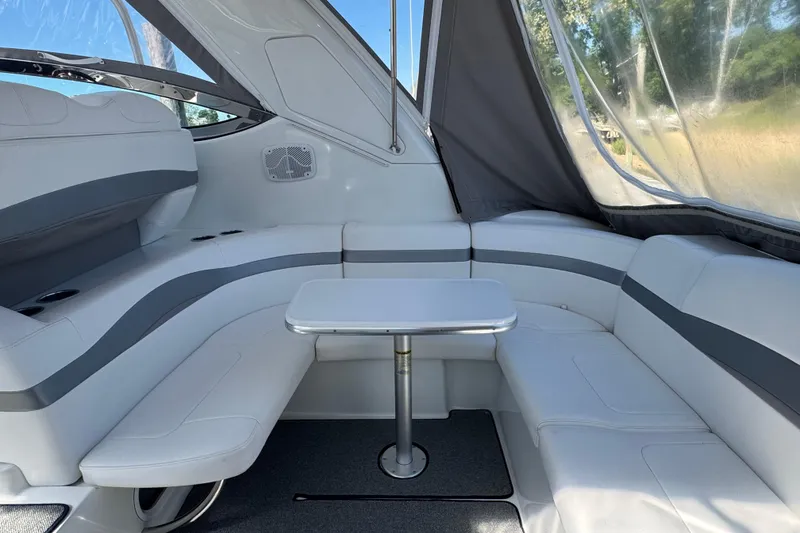 Slide: The Image of 2004 Formula 37 Performance Cruiser interior with white seating and table. - 9